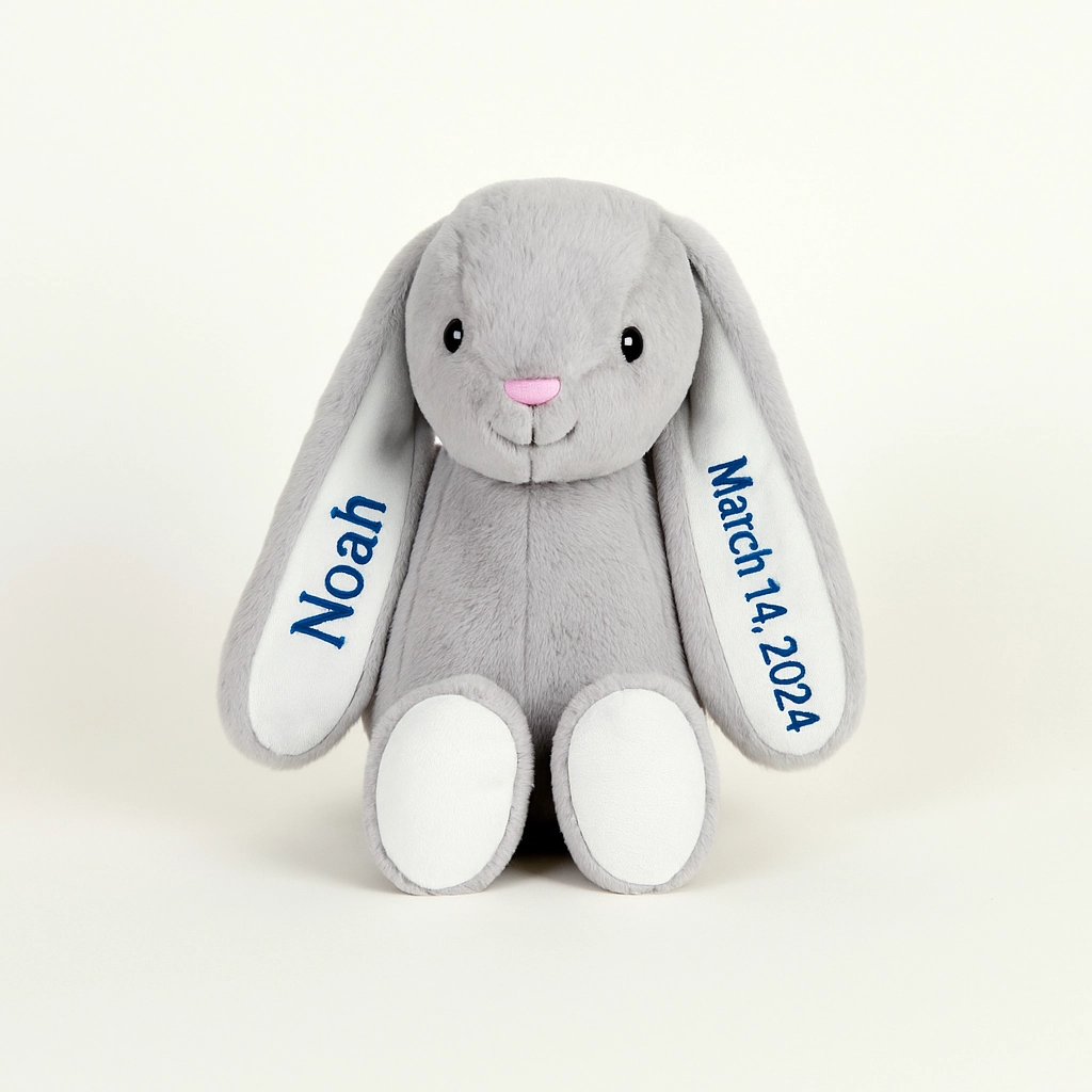 dumble bunnie with boys name and date of birth on ears